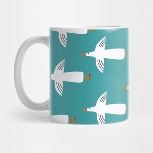 Flying white seagulls on blue background Mug